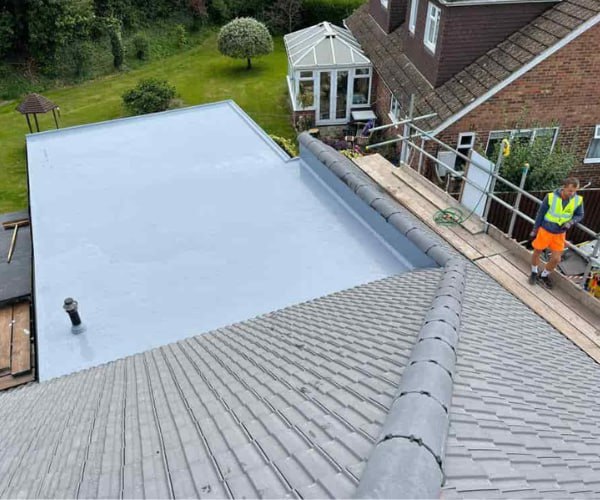 This is a photo of a newly installed hip roof, with a combined liquid covered flat roof. Work carried out by UG Roofing Hemsworth