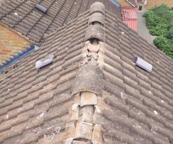 This is a photo if a roof ridge which has missing tiles. The ridge tiles are being replaced by UG Roofing Hemsworth